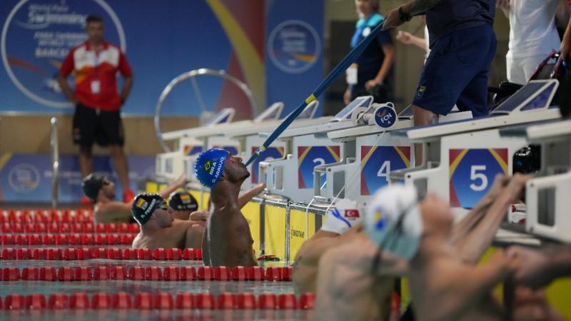 An athlete gets ready for his swim