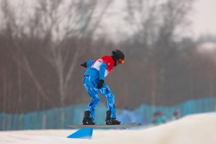 Jacopo Luchini doing Para snowboarding during the Beijing 2022 Paralympic Winter Games.