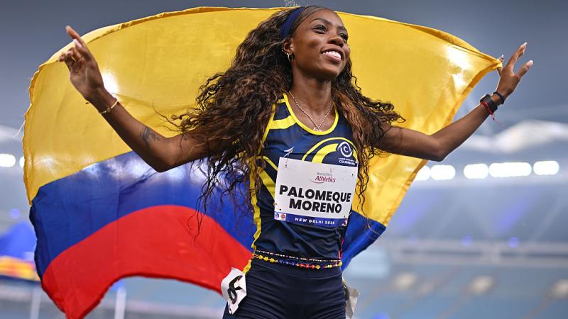 An athlete celebrates in joy