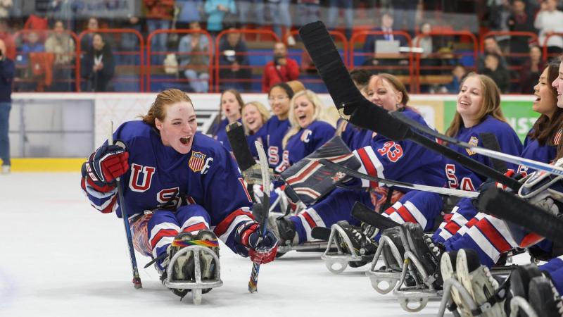 An athlete celebrates in joy